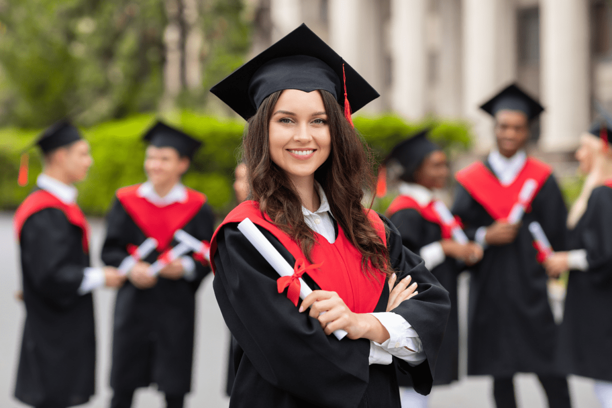 A young woman from a sorority proudly holding her college diploma, her face glowing with accomplishment and joy as she celebrates her academic success.